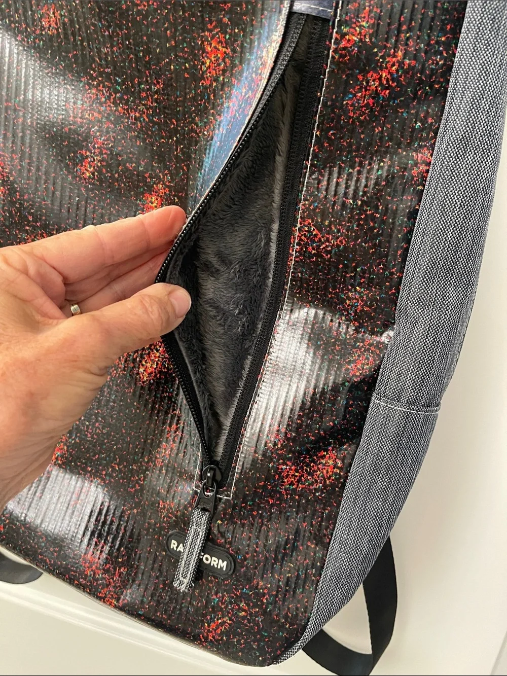 RAREFORM California Men's Black Backpack with Red and Blue Speckle Pattern